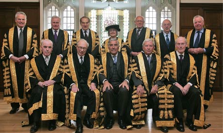 The justices of the Supreme Court. Twelve men, one woman, Lady Hale.