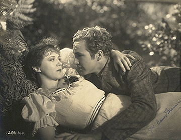 Ruth Chatterton and David Manners in the 1931 film The Right to Love, in which Ruth Chatterton played both Naomi and Brook.