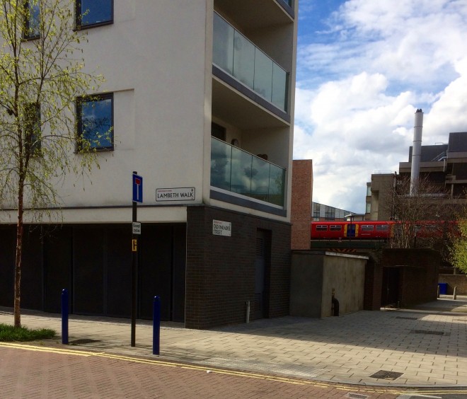 Lambeth Walk today. The brick building between the flats and the railway is Damien Hurst's Newport Street Gallery.